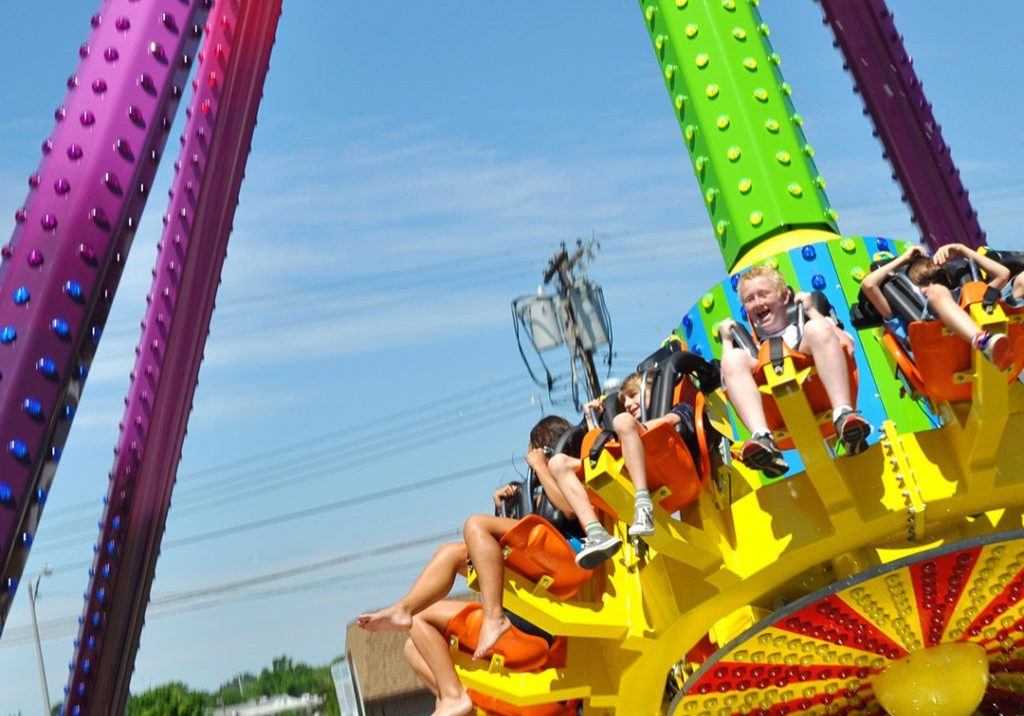 Pendolo Ride at Jenkinson's Boardwalk. Children smiling and having a fun time!